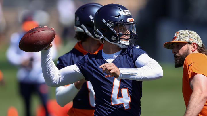 May 23, 2024; Englewood, CO, USA; Denver Broncos quarterback Zach Wilson (4) during organized team activities at Centura Health Training Center. May 23, 2024; Englewood, CO, USA; Denver Broncos quarterback Zach Wilson (4) during organized team activities at Centura Health Training Center.
