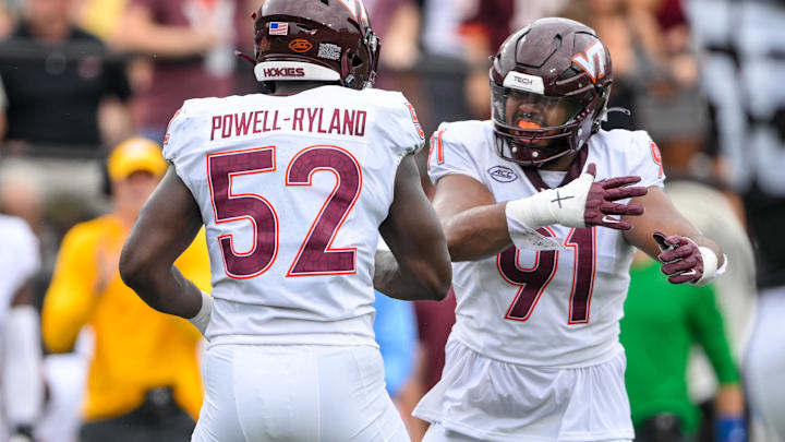 Aug 31, 2024; Virginia Tech defensive linemen Wilfried Pene (91) and Antwaun Powell-Ryland (52) celebrate a sack against Vanderbilt.