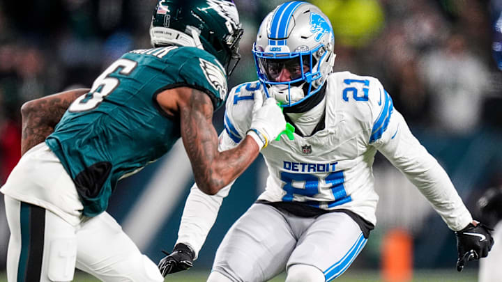 Detroit Lions cornerback Amik Robertson (21) defends Philadelphia Eagles wide receiver DeVonta Smith (6) during the first half at Lincoln Financial Field in Philadelphia on Sunday, November 16, 2025. Detroit Lions cornerback Amik Robertson (21) defends Philadelphia Eagles wide receiver DeVonta Smith (6) during the first half at Lincoln Financial Field in Philadelphia on Sunday, November 16, 2025.