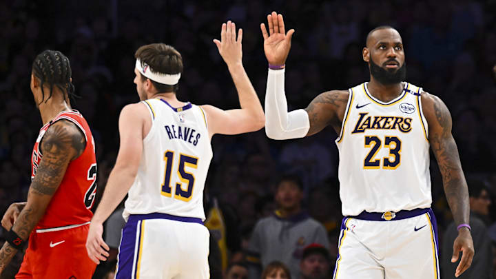Mar 22, 2025; Los Angeles, California, USA; Los Angeles Lakers forward LeBron James (23) fives guard Austin Reaves (15) after scoring against the Chicago Bulls during the second half at Crypto.com Arena. Mandatory Credit: Jonathan Hui-Imagn Images Mar 22, 2025; Los Angeles, California, USA; Los Angeles Lakers forward LeBron James (23) fives guard Austin Reaves (15) after scoring against the Chicago Bulls during the second half at Crypto.com Arena. Mandatory Credit: Jonathan Hui-Imagn Images