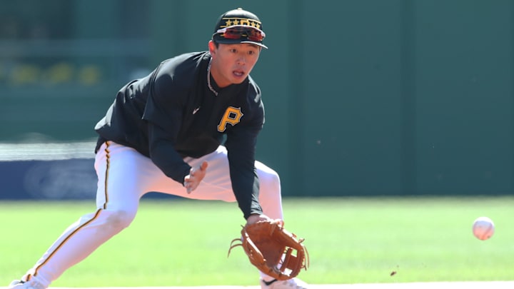 Apr 9, 2025; Pittsburgh, Pennsylvania, USA;  Pittsburgh Pirates shortstop Tsung-Che Cheng  (71) warms up before making his major league debut against the St. Louis Cardinals at PNC Park. Mandatory Credit: Charles LeClaire-Imagn Images