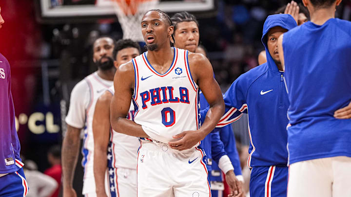 Mar 7, 2026; Atlanta, Georgia, USA; Philadelphia 76ers guard Tyrese Maxey (0) reacts and is assisted after being injured against the Atlanta Hawks during the second half at State Farm Arena. Mandatory Credit: Dale Zanine-Imagn Images
