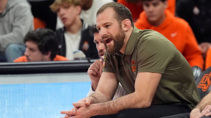 Oklahoma State head wrestling coach David Taylor coaches during the college wrestling dual between Oklahoma State and Air Force at Gallagher-Iba Arena in Stillwater, Okla., Friday, Jan., 3, 2025.