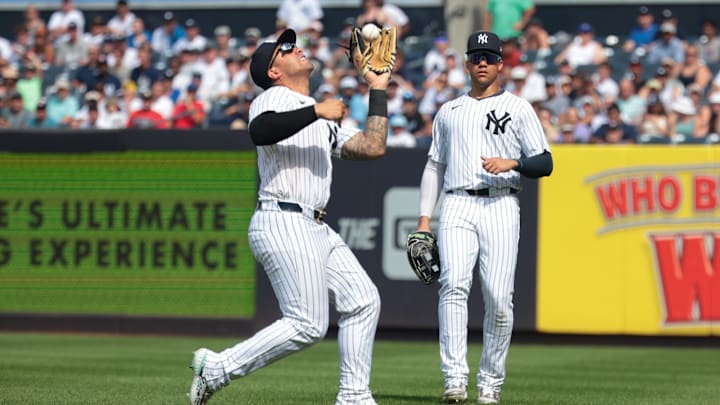 Aug 4, 2024; Bronx, New York, USA; New York Yankees second baseman Gleyber Torres (25) catches the ball for an out during the seventh inning against the Toronto Blue Jays in front of right fielder Juan Soto (22) at Yankee Stadium. Mandatory Credit: Vincent Carchietta-Imagn Images Aug 4, 2024; Bronx, New York, USA; New York Yankees second baseman Gleyber Torres (25) catches the ball for an out during the seventh inning against the Toronto Blue Jays in front of right fielder Juan Soto (22) at Yankee Stadium. Mandatory Credit: Vincent Carchietta-Imagn Images
