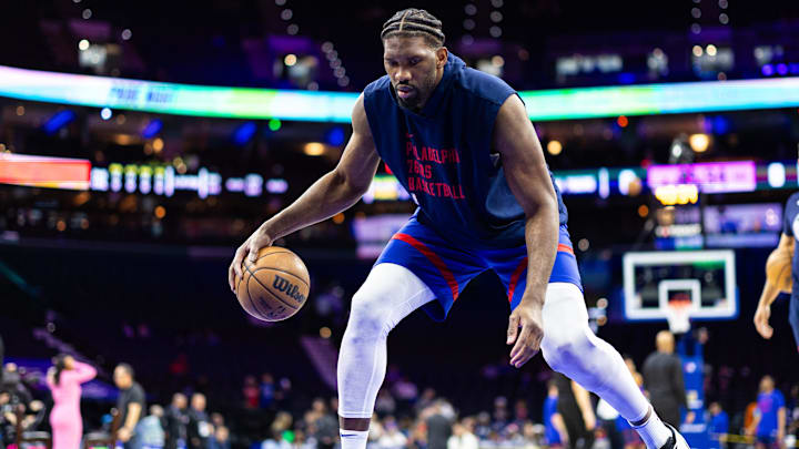 Apr 12, 2024; Philadelphia, Pennsylvania, USA; Philadelphia 76ers center Joel Embiid warms up before