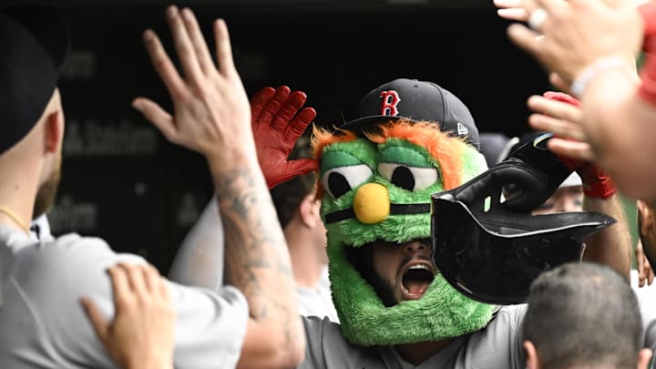 Jul 20, 2025; Chicago, Illinois, USA; Boston Red Sox outfielder Wilyer Abreu (52) celebrates in the dugout after hitting a two run home run against the Chicago Cubs during the seventh inning at Wrigley Field. Mandatory Credit: Matt Marton-Imagn Images Jul 20, 2025; Chicago, Illinois, USA; Boston Red Sox outfielder Wilyer Abreu (52) celebrates in the dugout after hitting a two run home run against the Chicago Cubs during the seventh inning at Wrigley Field. Mandatory Credit: Matt Marton-Imagn Images