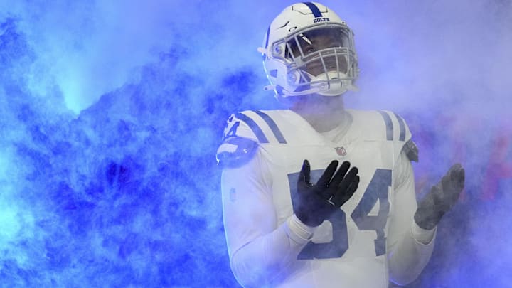 Dec 22, 2024; Indianapolis, Indiana, USA; Indianapolis Colts defensive end Dayo Odeyingbo (54) takes the field ahead of a game against the Tennessee Titans at Lucas Oil Stadium at Lucas Oil Stadium. Mandatory Credit: Christine Tannous/USA Today Network via Imagn Images Dec 22, 2024; Indianapolis, Indiana, USA; Indianapolis Colts defensive end Dayo Odeyingbo (54) takes the field ahead of a game against the Tennessee Titans at Lucas Oil Stadium at Lucas Oil Stadium. Mandatory Credit: Christine Tannous/USA Today Network via Imagn Images
