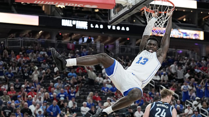 Nov 3, 2025; Las Vegas, Nevada, USA; BYU Cougars center Keba Keita (13) dunks against the Villanova Wildcats during the first half of the Hall of Fame Series game at T-Mobile Arena. Mandatory Credit: Candice Ward-Imagn Images