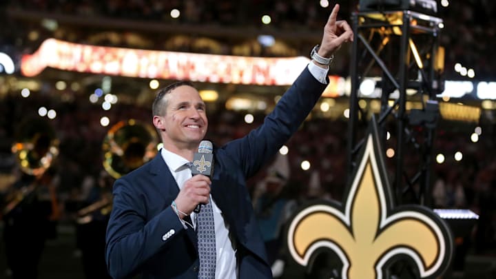 Former New Orleans Saints quarterback Drew Brees is honored at halftime of a game.
