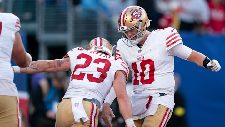 San Francisco 49ers quarterback Mac Jones (10) celebrates with San Francisco 49ers running back Christian McCaffrey (23) after scoring a touchdown during a week 9 game between New York Giants and San Francisco 49ers at MetLife Stadium on Sunday, Nov. 2, 2025.