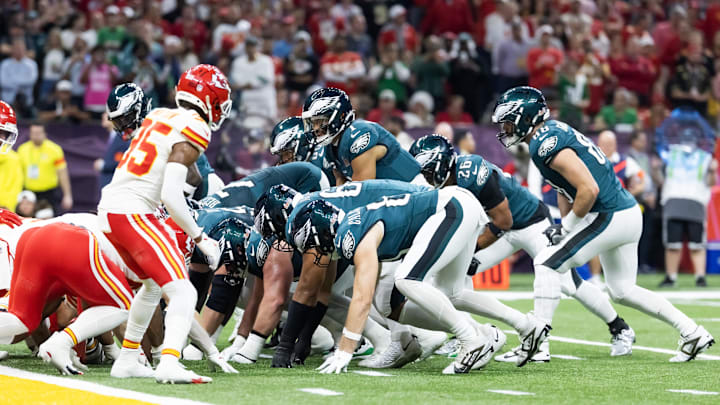 Feb 9, 2025; New Orleans, LA, USA; Philadelphia Eagles  quarterback Jalen Hurts (1) lines up for the tush push play on the goal line against the Kansas City Chiefs during Super Bowl LIX at Ceasars Superdome. Mandatory Credit: Mark J. Rebilas-Imagn Images