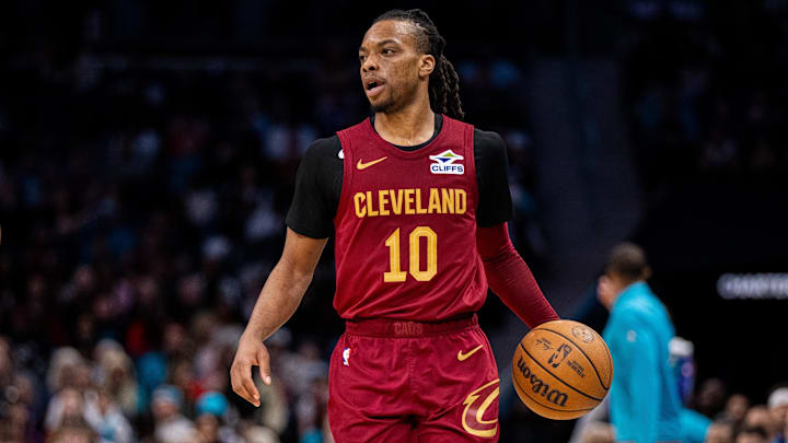 Mar 7, 2025; Charlotte, North Carolina, USA; Cleveland Cavaliers guard Darius Garland (10) brings the ball up court against the Charlotte Hornets during the third quarter at Spectrum Center. Mandatory Credit: Scott Kinser-Imagn Images