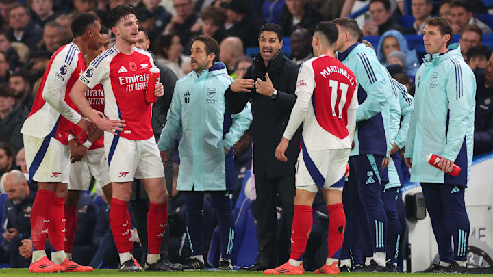 Mikel Arteta (centre) and his players have endured some highs and more lows this season