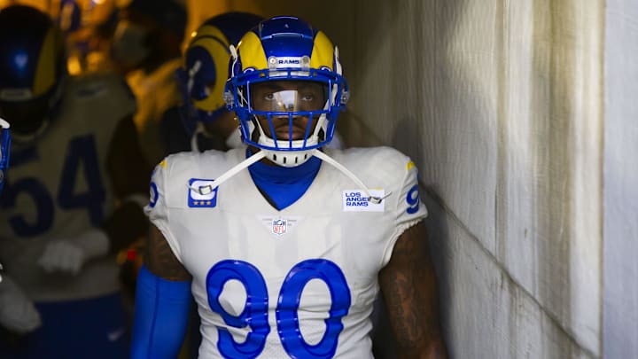 Jan 16, 2021; Green Bay, Wisconsin, USA; Los Angeles Rams defensive tackle Michael Brockers (90) against Green Bay Packers during the NFC Divisional Round at Lambeau Field. Mandatory Credit: Mark J. Rebilas-Imagn Images