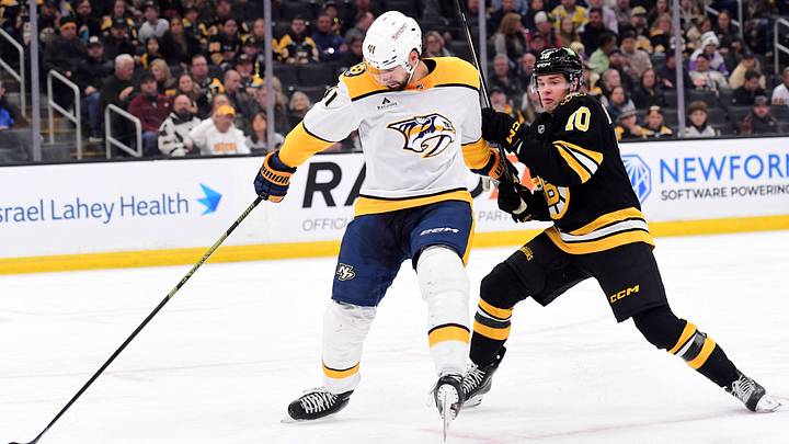 Oct 22, 2026; Boston, Massachusetts, USA; Nashville Predators defenseman Nicolas Hague (41) and Boston Bruins right wing JJ Peterka (10) battle for the puck during the first period at TD Garden. Mandatory Credit: Bob DeChiara-Imagn Images Oct 22, 2026; Boston, Massachusetts, USA; Nashville Predators defenseman Nicolas Hague (41) and Boston Bruins right wing JJ Peterka (10) battle for the puck during the first period at TD Garden. Mandatory Credit: Bob DeChiara-Imagn Images
