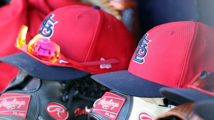 Mar 6, 2019; Tampa, FL, USA; St. Louis Cardinals hat and gloves lay in the dugout at George M. Steinbrenner Field. Mandatory Credit: Kim Klement-Imagn Images Mar 6, 2019; Tampa, FL, USA; St. Louis Cardinals hat and gloves lay in the dugout at George M. Steinbrenner Field. Mandatory Credit: Kim Klement-Imagn Images