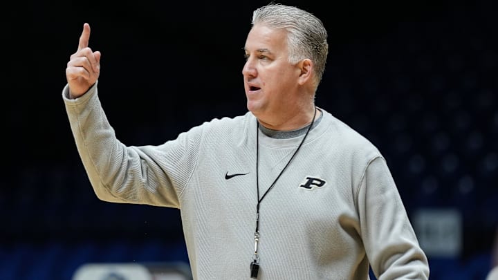 Purdue Boilermakers head coach Matt Painter talks to players 