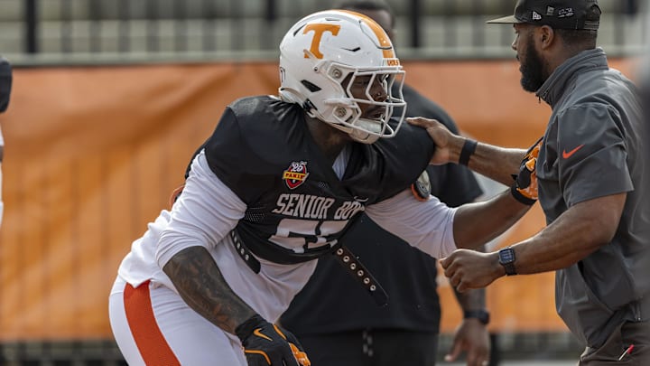 Jan 30, 2025; Mobile, AL, USA; American team defensive lineman Omarr Norman-Lott of Tennessee (55) works through drills during Senior Bowl practice for the American team at Hancock Whitney Stadium.  