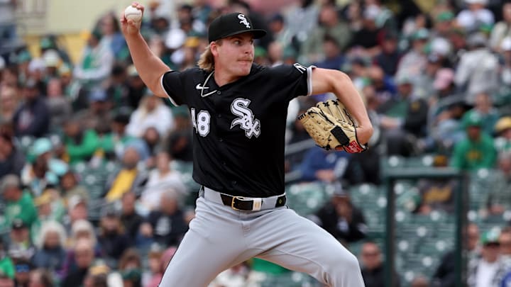 Chicago White Sox pitcher Jonathan Cannon throws a pitch against the Athletics.