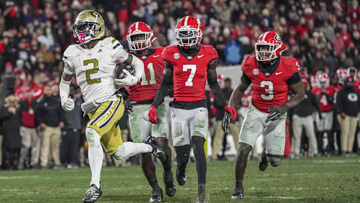 Nov 29, 2024; Athens, Georgia, USA; Georgia Tech Yellow Jackets wide receiver Eric Singleton Jr. (2) scores a touchdown against the Georgia Bulldogs during overtime at Sanford Stadium. Mandatory Credit: Dale Zanine-Imagn Images