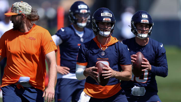 May 23, 2024; Englewood, CO, USA; Denver Broncos quarterback Jarrett Stidham (8) and quarterback Bo Nix (10) during organized team activities at Centura Health Training Center. May 23, 2024; Englewood, CO, USA; Denver Broncos quarterback Jarrett Stidham (8) and quarterback Bo Nix (10) during organized team activities at Centura Health Training Center.