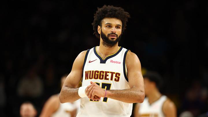 Nov 29, 2025; Phoenix, Arizona, USA; Denver Nuggets guard Jamal Murray (27) against the Phoenix Suns at the Mortgage Matchup Center. Nov 29, 2025; Phoenix, Arizona, USA; Denver Nuggets guard Jamal Murray (27) against the Phoenix Suns at the Mortgage Matchup Center.