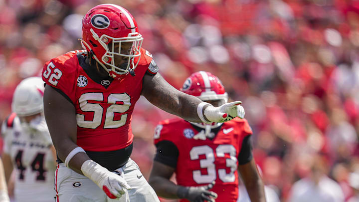 Sep 9, 2023; Athens, Georgia, USA; Georgia Bulldogs defensive lineman Christen Miller (52) reacts after making a tackle against the Ball State Cardinals during the second half at Sanford Stadium. Mandatory Credit: Dale Zanine-Imagn Images