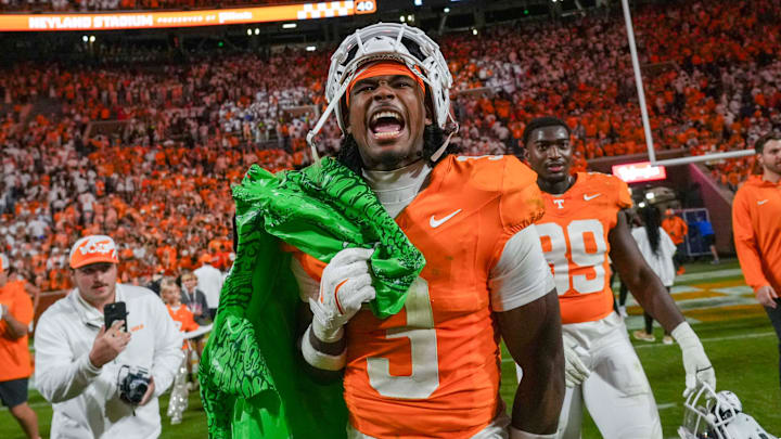 Tennessee defensive back Jermod McCoy yells while carrying a deflated gator after defeating Florida at Neyland Stadium