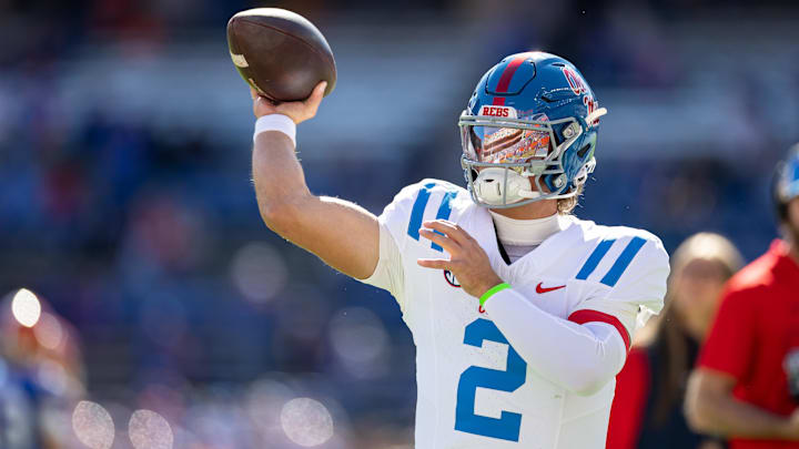 Nov 23, 2024; Gainesville, Florida, USA; Mississippi Rebels quarterback Jaxson Dart (2) warms up before a game against the Florida Gators at Ben Hill Griffin Stadium. Mandatory Credit: Matt Pendleton-Imagn Images