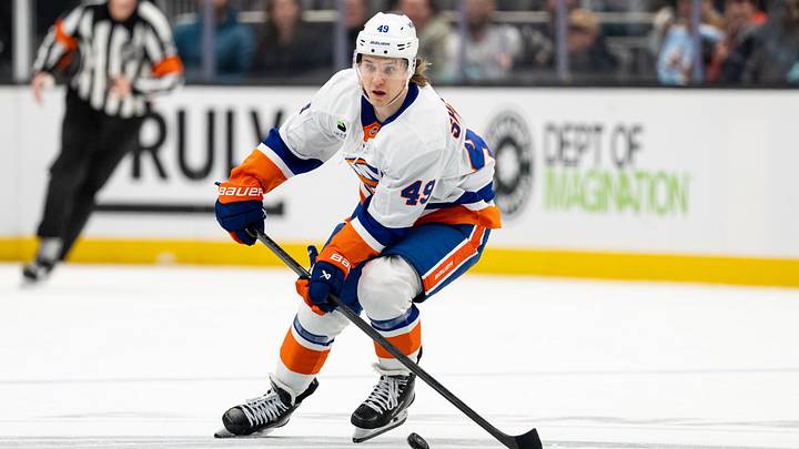 Jan 21, 2026; Seattle, Washington, USA; New York Islanders forward Max Shabanov (49) skates with the puck against the Seattle Kraken at Climate Pledge Arena. Mandatory Credit: Stephen Brashear-Imagn Images