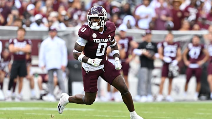 Oct 5, 2024; College Station, Texas, USA; Texas A&M Aggies linebacker Scooby Williams (0) defends in coverage in the fourth quarter against the Missouri Tigers at Kyle Field. Mandatory Credit: Maria Lysaker-Imagn Images. 
