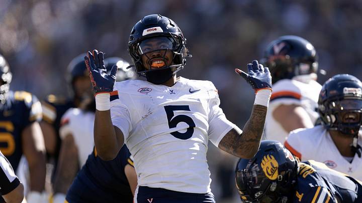 Nov 1, 2025; Berkeley, California, USA; Virginia Cavaliers linebacker Kam Robinson (5) reacts after sacking California Golden Bears quarterback Jaron-Keawe Sagapolutele (not pictured) during the second quarter at California Memorial Stadium. Mandatory Credit: D. Ross Cameron-Imagn Images Nov 1, 2025; Berkeley, California, USA; Virginia Cavaliers linebacker Kam Robinson (5) reacts after sacking California Golden Bears quarterback Jaron-Keawe Sagapolutele (not pictured) during the second quarter at California Memorial Stadium. Mandatory Credit: D. Ross Cameron-Imagn Images