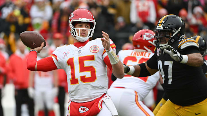 Dec 25, 2024; Pittsburgh, Pennsylvania, USA; Kansas City Chiefs quarterback Patrick Mahomes (15) throws a pass while being pressured by Pittsburgh Steelers defensive tackle Cameron Heyward (97) during the first quarter at Acrisure Stadium. Mandatory Credit: Barry Reeger-Imagn Images Dec 25, 2024; Pittsburgh, Pennsylvania, USA; Kansas City Chiefs quarterback Patrick Mahomes (15) throws a pass while being pressured by Pittsburgh Steelers defensive tackle Cameron Heyward (97) during the first quarter at Acrisure Stadium. Mandatory Credit: Barry Reeger-Imagn Images