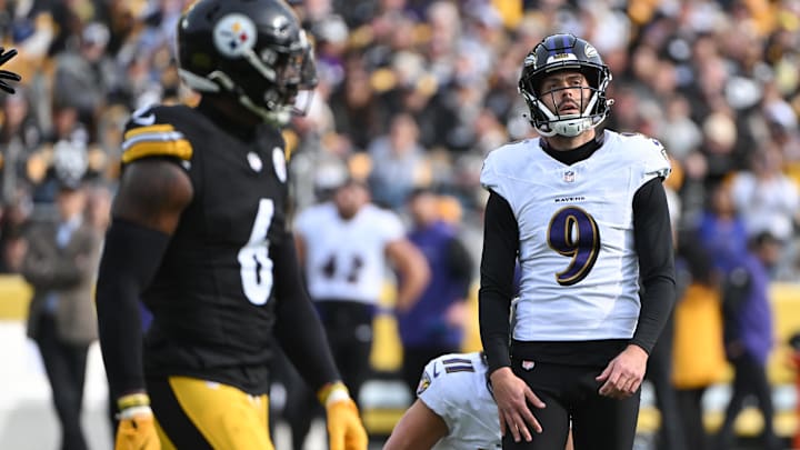 Nov 17, 2024; Pittsburgh, Pennsylvania, USA; Baltimore Ravens place kicker Justin Tucker (9) reacts to a missed field goal against the Pittsburgh Steelers during the first quarter at Acrisure Stadium. Mandatory Credit: Barry Reeger-Imagn Images