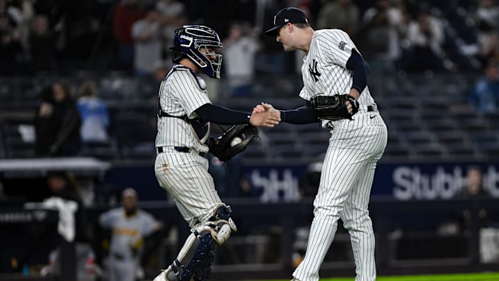 Sep 29, 2024; Bronx, New York, USA; New York Yankees catcher Jose Trevino (39) and New York Yankees pitcher Clay Holmes (35) slap hands after the games final out against the Pittsburgh Pirates at Yankee Stadium. Mandatory Credit: John Jones-Imagn Images Sep 29, 2024; Bronx, New York, USA; New York Yankees catcher Jose Trevino (39) and New York Yankees pitcher Clay Holmes (35) slap hands after the games final out against the Pittsburgh Pirates at Yankee Stadium. Mandatory Credit: John Jones-Imagn Images