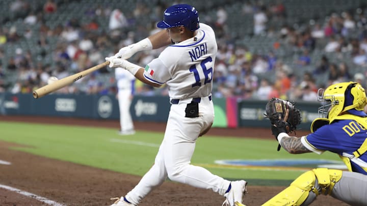 Mar 7, 2026; Houston, TX, United States; Italy left fielder Dante Nori (16) hits a home run during the seventh inning against Brazil at Daikin Park. Mandatory Credit: Troy Taormina-Imagn Images