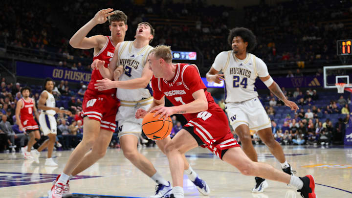 Feb 28, 2026; Seattle, Washington, USA; Wisconsin Badgers guard Andrew Rohde (7) dribbles the ball against the Washington Huskies during the second half at Alaska Airlines Arena at Hec Edmundson Pavilion. Mandatory Credit: Steven Bisig-Imagn Images