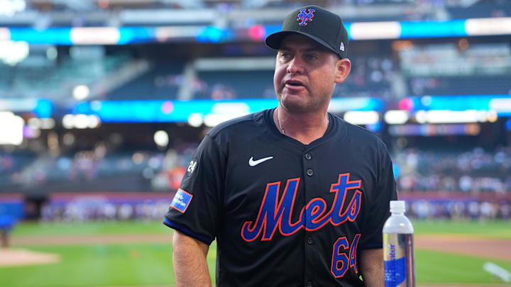 Jul 10, 2024; New York City, New York, USA; New York Mets manager Carlos Mendoza (64) prior to the game against the Washington Nationals at Citi Field. Mandatory Credit: Gregory Fisher-Imagn Images