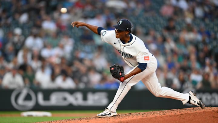 Jul 1, 2025; Seattle, Washington, USA; Seattle Mariners relief pitcher Juan Burgos (67) pitches to the Kansas City Royals during the eighth inning at T-Mobile Park. Mandatory Credit: Steven Bisig-Imagn Images Jul 1, 2025; Seattle, Washington, USA; Seattle Mariners relief pitcher Juan Burgos (67) pitches to the Kansas City Royals during the eighth inning at T-Mobile Park. Mandatory Credit: Steven Bisig-Imagn Images