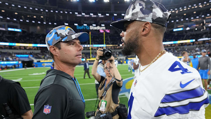 Aug 20, 2022; Inglewood, California, USA; Los Angeles Chargers head coach Brandon Staley (left)