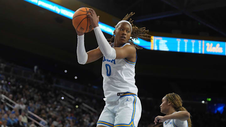 Feb 16, 2025; Los Angeles, California, USA; UCLA Bruins forward Janiah Barker (0) rebounds the ball against the Michigan State Spartans in the first half at Pauley Pavilion presented by Wescom. Mandatory Credit: Kirby Lee-Imagn Images Feb 16, 2025; Los Angeles, California, USA; UCLA Bruins forward Janiah Barker (0) rebounds the ball against the Michigan State Spartans in the first half at Pauley Pavilion presented by Wescom. Mandatory Credit: Kirby Lee-Imagn Images