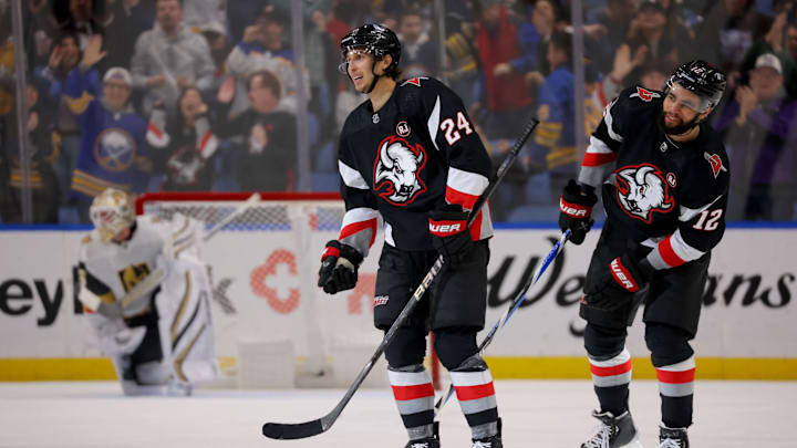 Buffalo Sabres center Dylan Cozens and winger Jordan Greenway.