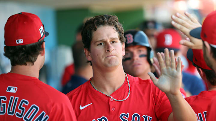 Feb 28, 2025; Clearwater, Florida, USA; Boston Red Sox outfielder Roman Anthony (48) is congratulated after he scored a run against the Philadelphia Phillies during the third inning at BayCare Ballpark. Mandatory Credit: Kim Klement Neitzel-Imagn Images Feb 28, 2025; Clearwater, Florida, USA; Boston Red Sox outfielder Roman Anthony (48) is congratulated after he scored a run against the Philadelphia Phillies during the third inning at BayCare Ballpark. Mandatory Credit: Kim Klement Neitzel-Imagn Images