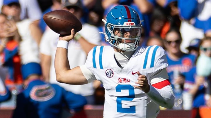 Nov 23, 2024; Gainesville, Florida, USA; Mississippi Rebels quarterback Jaxson Dart (2) throws the ball against the Florida Gators during the first half at Ben Hill Griffin Stadium. Mandatory Credit: Matt Pendleton-Imagn Images Nov 23, 2024; Gainesville, Florida, USA; Mississippi Rebels quarterback Jaxson Dart (2) throws the ball against the Florida Gators during the first half at Ben Hill Griffin Stadium. Mandatory Credit: Matt Pendleton-Imagn Images