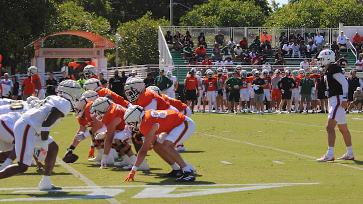 Miami Hurricane quarterback Emory Williams (17) preparing for a goal line push against the Hurricanes defense during the spring game.
