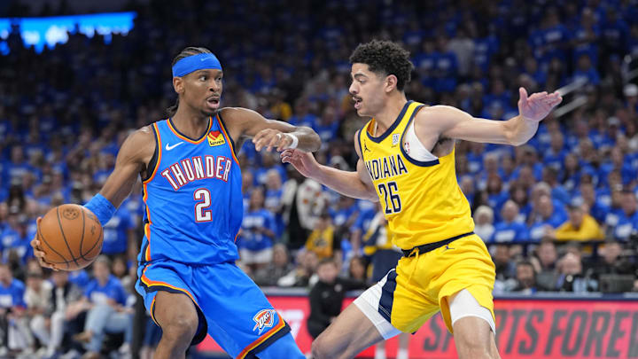 Jun 8, 2025; Oklahoma City, Oklahoma, USA; Oklahoma City Thunder guard Shai Gilgeous-Alexander (2) dribbles the ball against Indiana Pacers guard Ben Sheppard (26) during the second half during game two of the 2025 NBA Finals at Paycom Center. Mandatory Credit: Kyle Terada-Imagn Images Jun 8, 2025; Oklahoma City, Oklahoma, USA; Oklahoma City Thunder guard Shai Gilgeous-Alexander (2) dribbles the ball against Indiana Pacers guard Ben Sheppard (26) during the second half during game two of the 2025 NBA Finals at Paycom Center. Mandatory Credit: Kyle Terada-Imagn Images