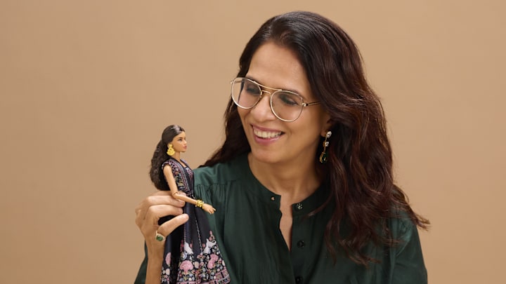 Anita Dongre with the Barbie Signature Diwali Doll. Credit Mattel