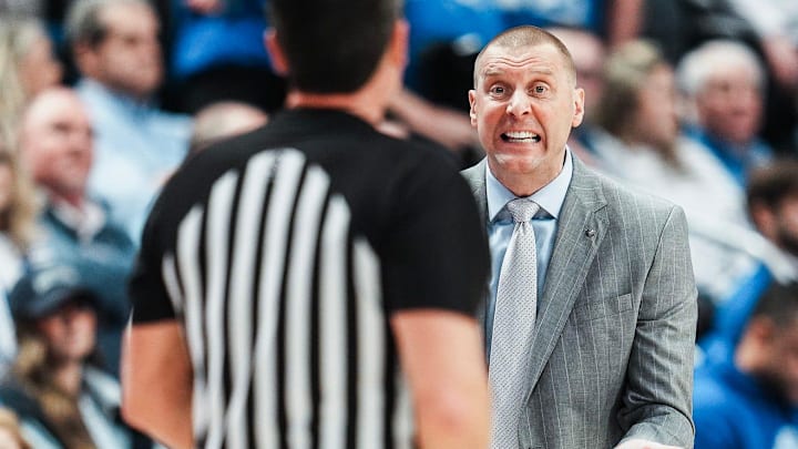Kentucky Wildcats head coach Mark Pope argues with an official during SEC college basketball Wednesday night at Rupp Arena in Lexington, Kentucky January 7, 2026. Pope would be ejected from the game in the second half.