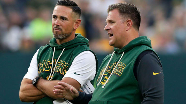 Green Bay Packers Head Coach Matt LaFleur and General Manager Brian Gutekunst talk on the field during Green Bay Packers Family Night on Aug. 2, 2025, at Lambeau Field in Green Bay, Wis.