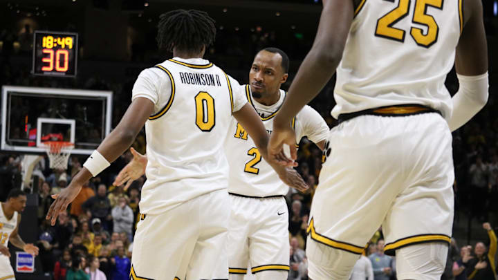 Feb. 19, 2025; Columbia, Missouri, USA; Missouri Tigers guard Anthony Robinson II (0), Tamar Bates (0) and forward Mark Mitchell (25) celebrate against the Alabama Crimson Tide at Mizzou Arena. Feb. 19, 2025; Columbia, Missouri, USA; Missouri Tigers guard Anthony Robinson II (0), Tamar Bates (0) and forward Mark Mitchell (25) celebrate against the Alabama Crimson Tide at Mizzou Arena.
